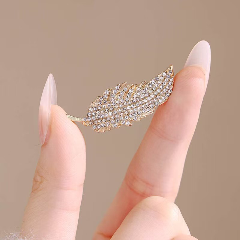 Broche de penas de diamante co - Travel Accessories Luxury avaliação e preço